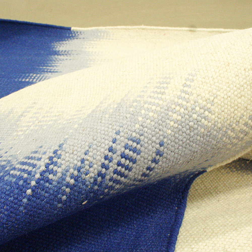 Handgewebter Wollteppich Alicia 120 x 180 cm blau creme Muster