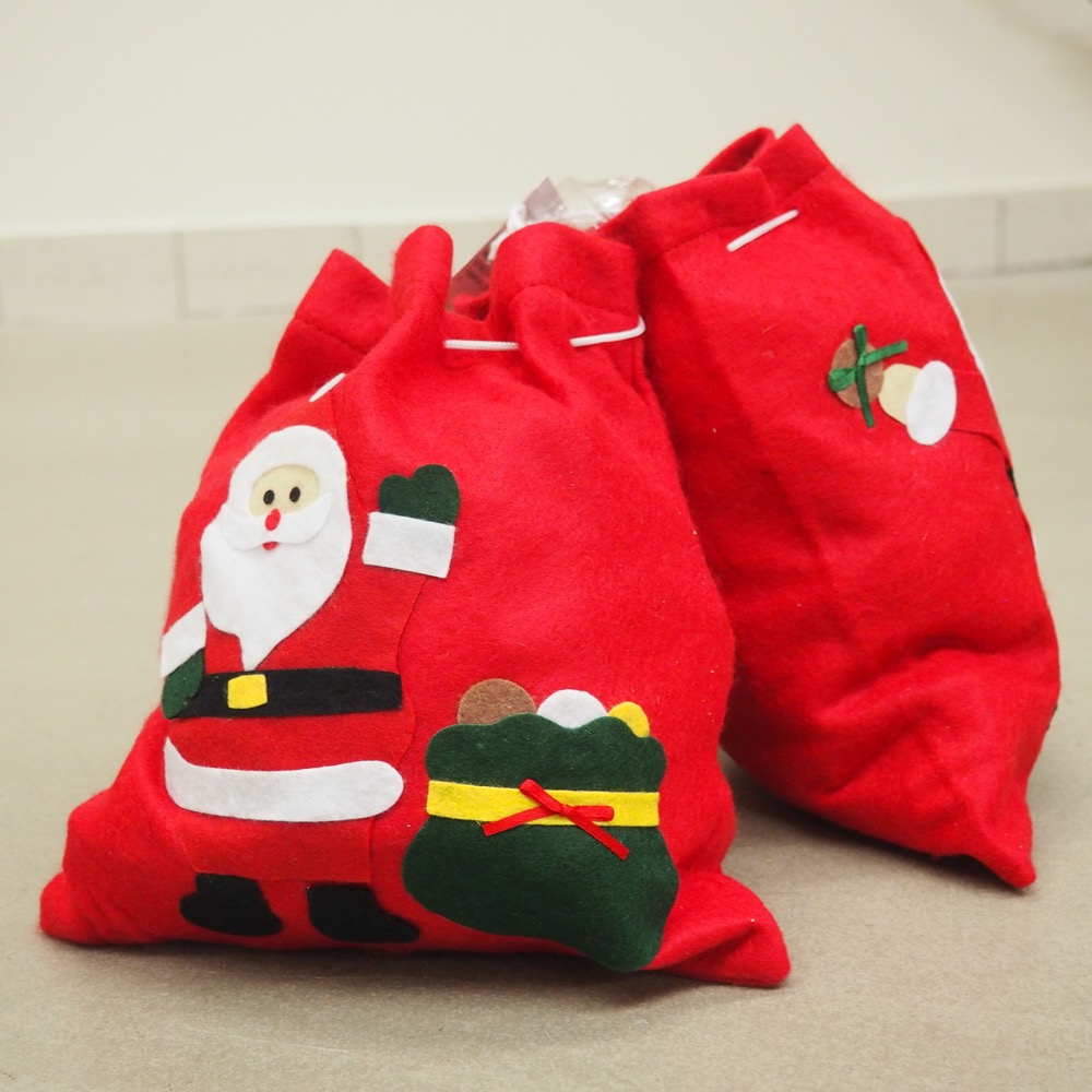 Weihnachtsbeutel Filz 2-tlg.Happy Santa mit Zugband je ca. 23 x 26 cm