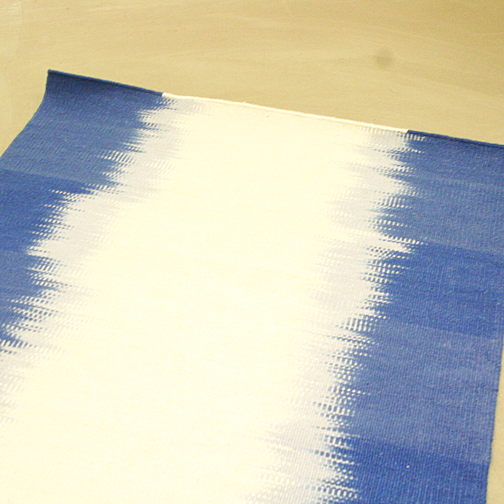 Handgewebter Wollteppich Alicia 120 x 180 cm blau creme Muster